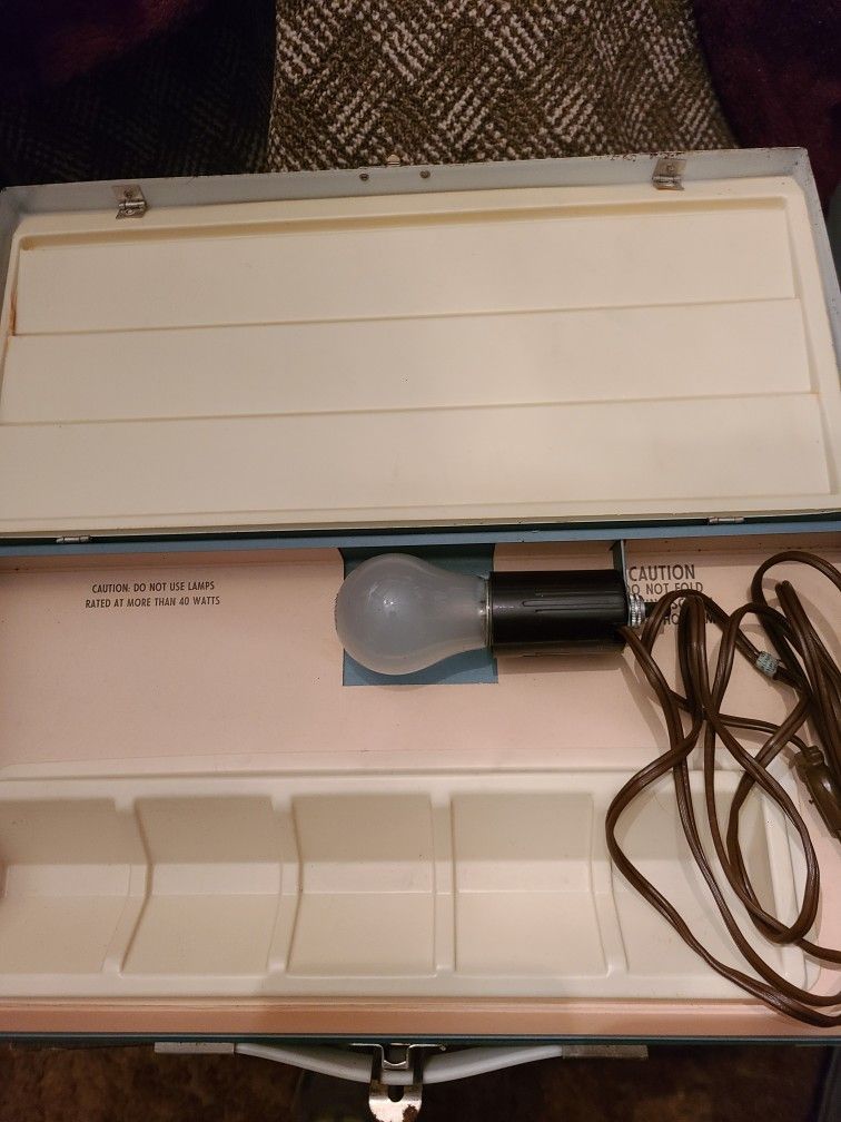 Vintage metal lighted slide sorter. West, east or north