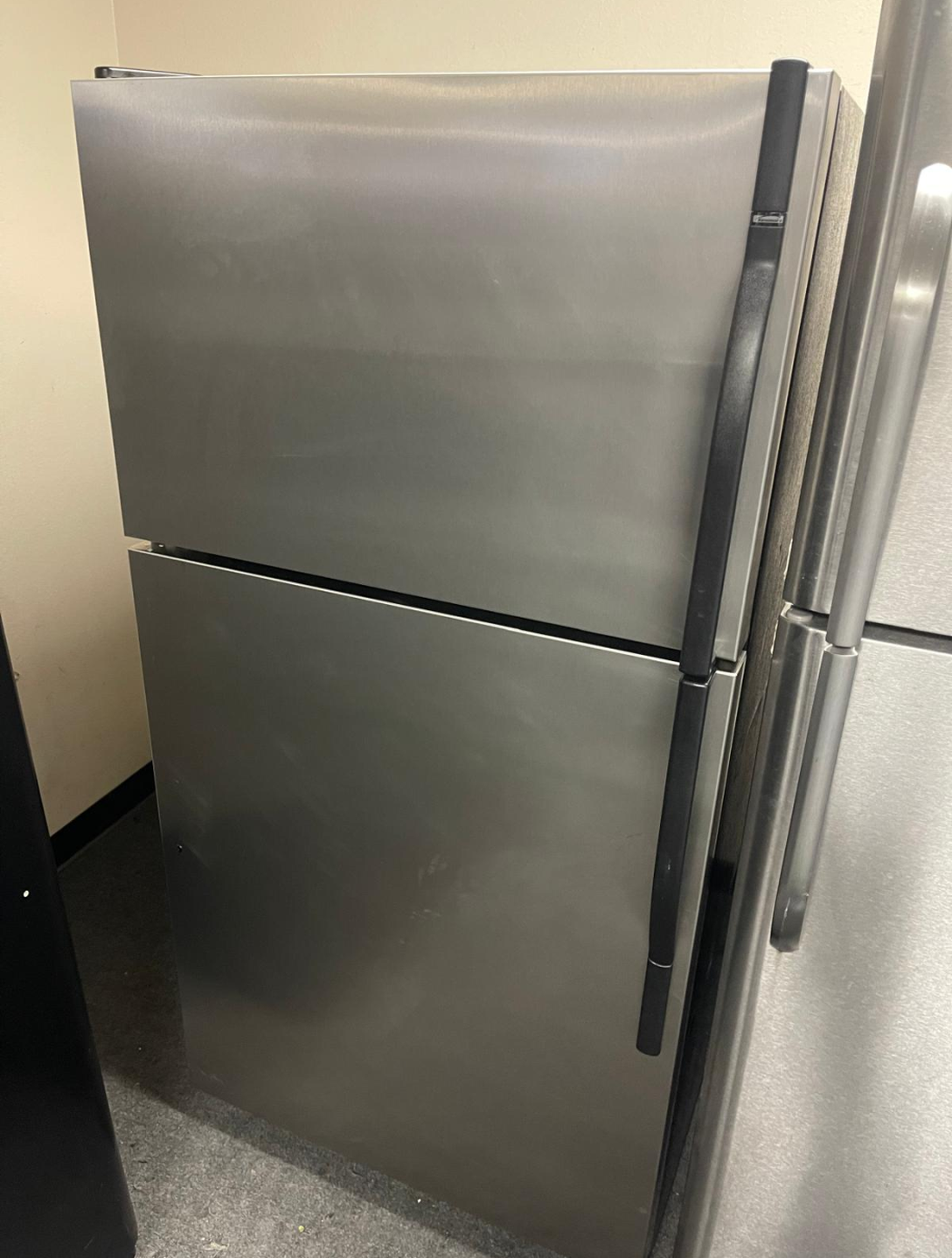 Sleek Stainless Top Freezer Fridge