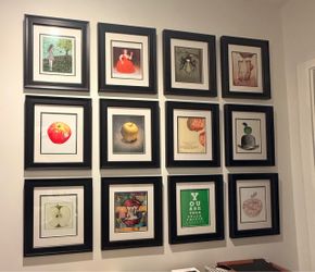 12 picture frames with cream/black matting
