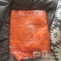 Top is used. Bottoms are brand new with tags both large