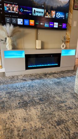 gray TV Stand covered with white with Electric Fireplace and LED Lights