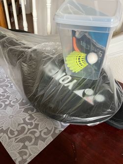 Yonex Racket with extra string  and shuttle
