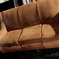 Sofabed And Granite Coffee Table.