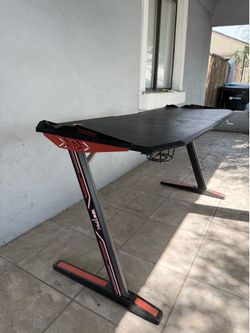 Gaming desk with cup holder
