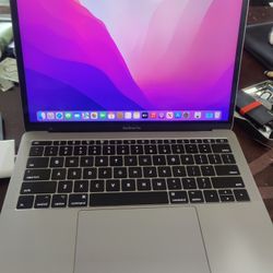 MacBook Pro 13" 2017 Intel Core i5@ 2.3GHz, 8 GB Ram, 256GB SSD, macos Monterey, Microsoft Office Package. Comes with Charger.

Has minor cracks on th