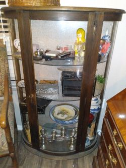 Curved Wood And Glass Curio Cabinet