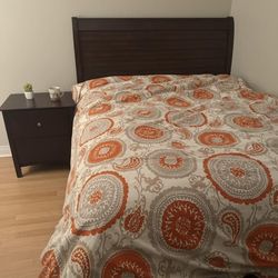 Bed, mattress and nightstand.