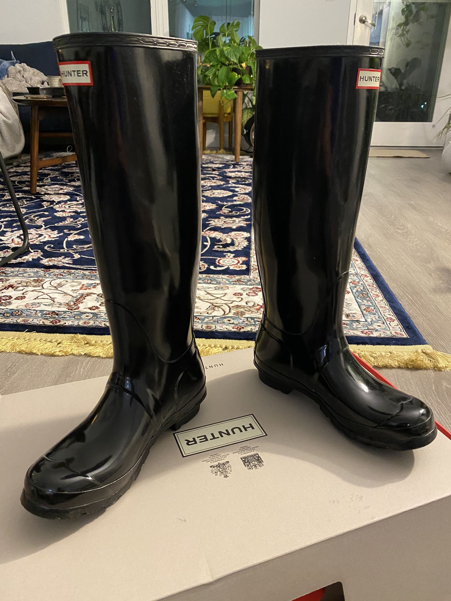 Hunter women tall rain boots in glossy black