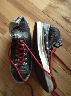 Brown leather converse