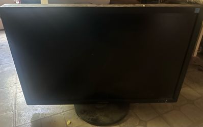 Samsung 305T 30-inch LCD monitor is black with a circular base stand. As is. Sitting in storage