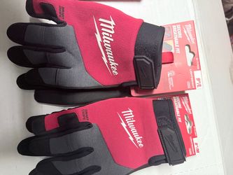Milwaukee tape measure and glove