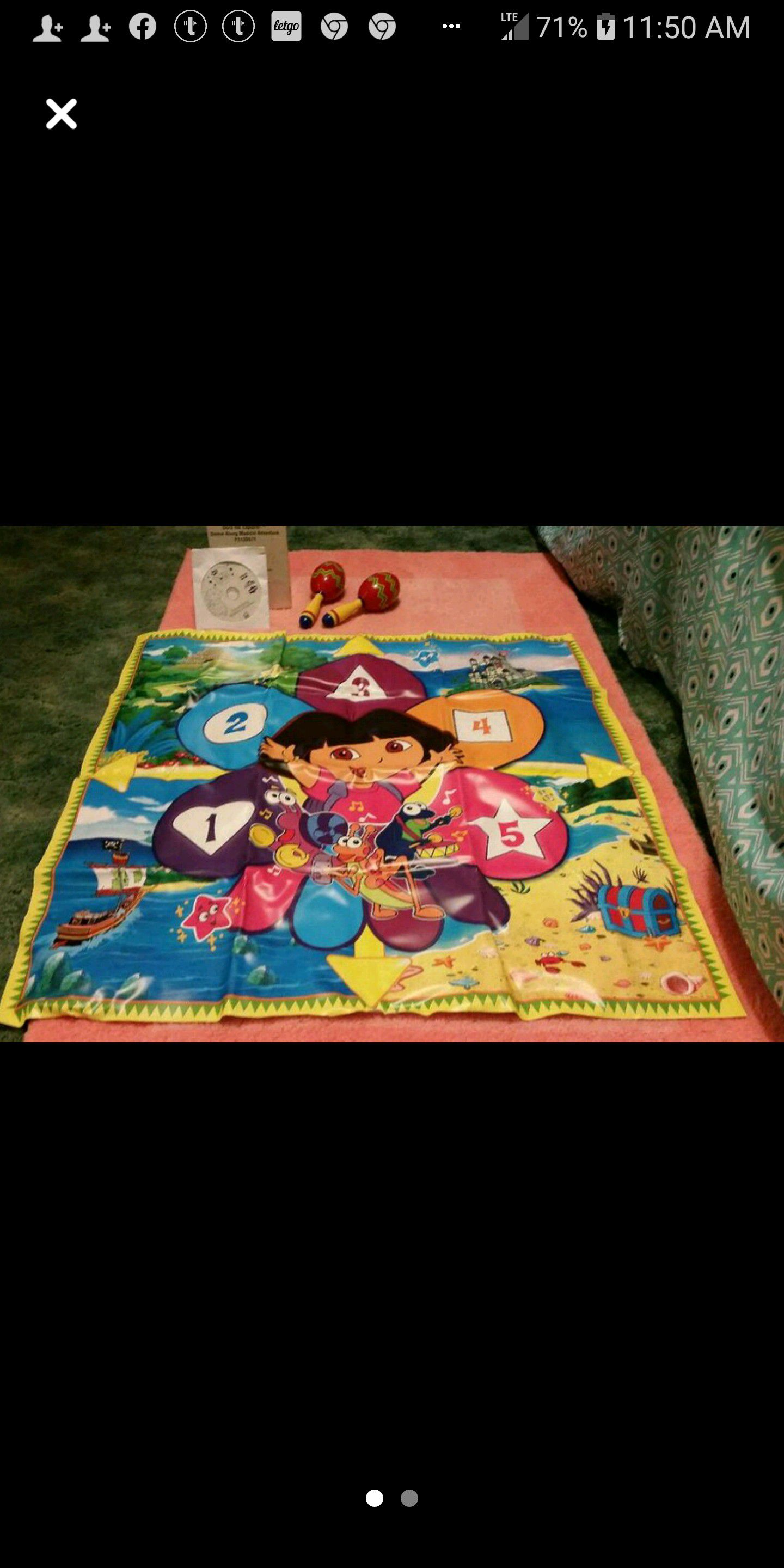 Dora the explorer pad with DVD sing along & maracas