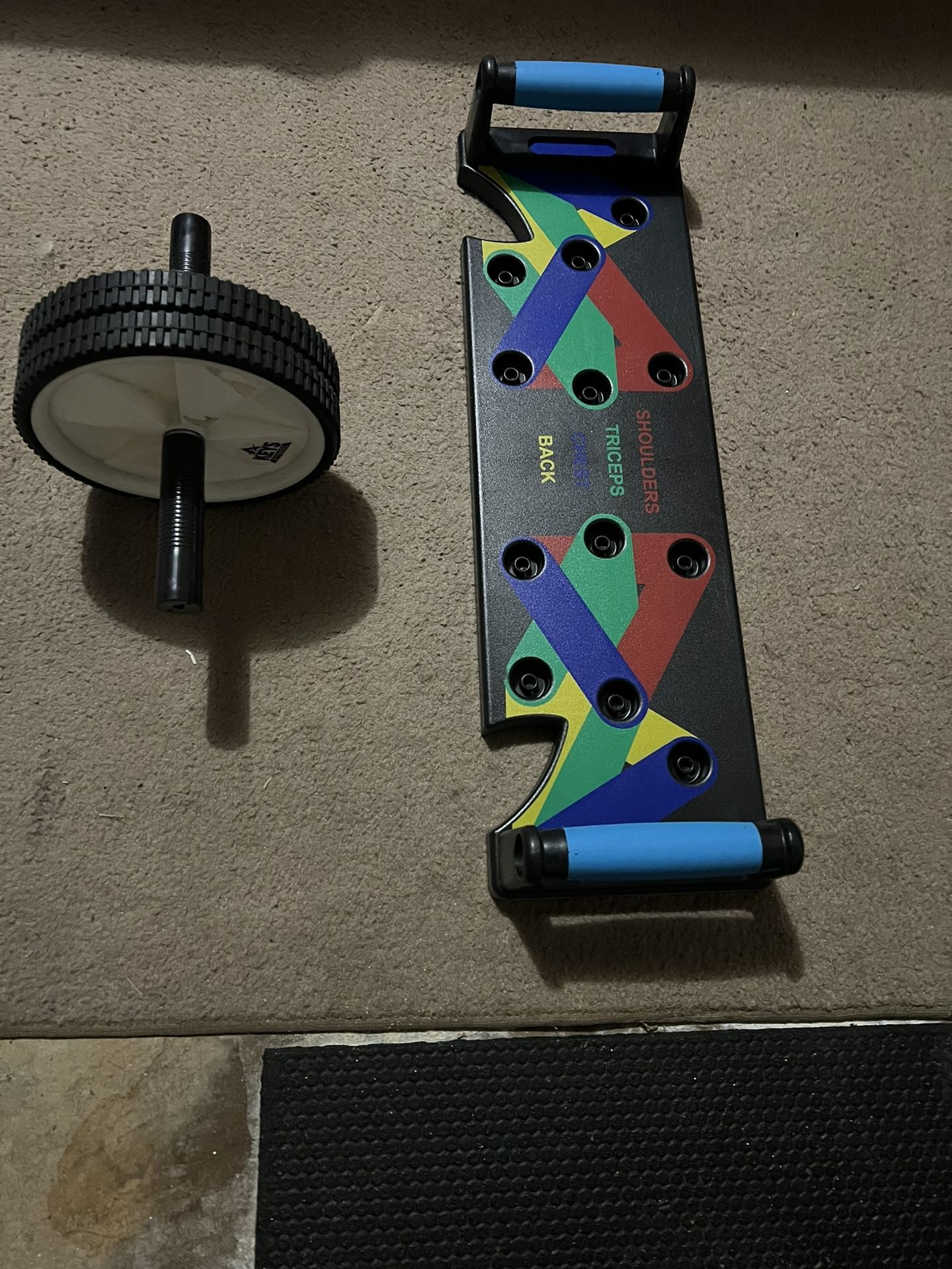 Push Up Board And An Roller Wheel