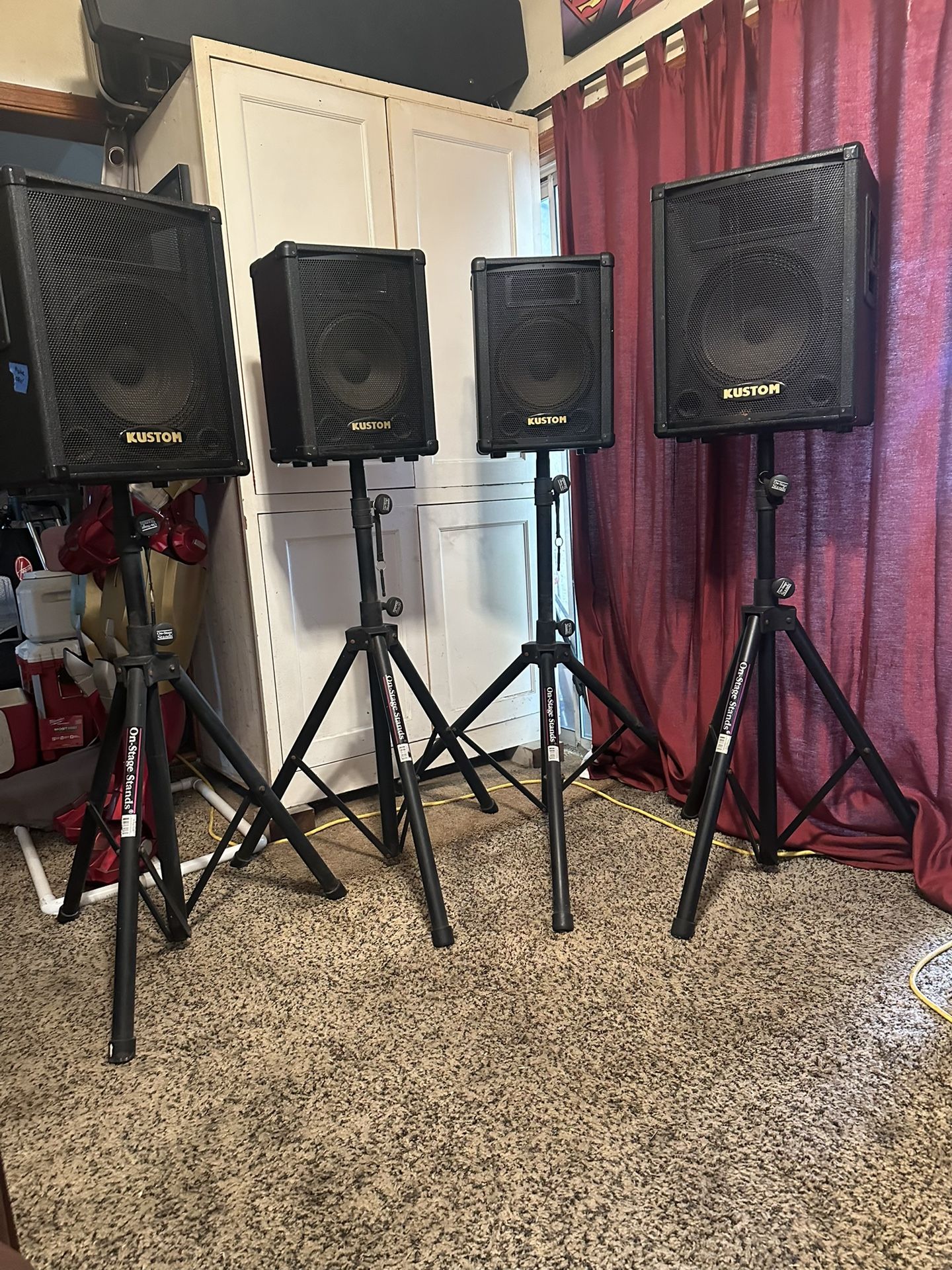 FOUR KUSTOM SPEAKERS AND STANDS
