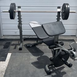 Bench, Rack, Weights And Barbell 