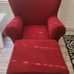 Chair and Ottoman With Red Slip Covers