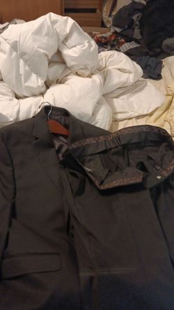 Ralf Lauren suit jacket and pants! In perfect condition Pants are 33×30  and the jacket fits with the pants.