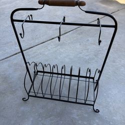 vintage black wrought iron plate and cup holder, styled for farmhouse kitchen decor.