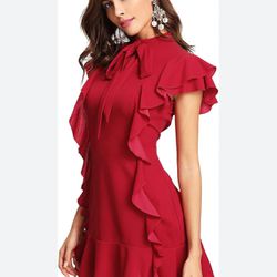 red ruffled tie neck dress