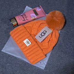 Orange UGG Beanie and Victoria's Secret Lotion