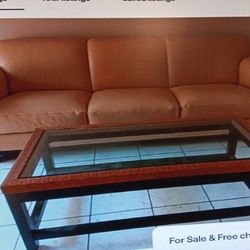 Beige Leather Sofa And Glass Coffee Table