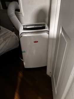 Portable indoor/ outdoor air conditioner-heater