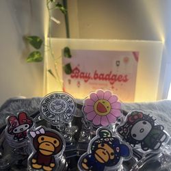 Hello kitty & bape badge reels