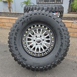 17" KM239 beadlocks w/ 35x12.50R17 Falken Wildpeak MT tires
