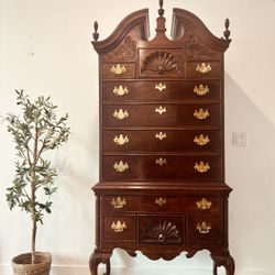 Vintage dresser  Materials: Mahogany, Brass Thomasville Chippendale Style Mahogany Bonnet- Top Highboy 37" W x 20" D x 84" H  The listing is for this 