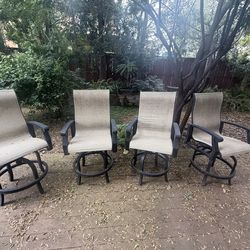 Four Swivel Outdoor Patio Chairs