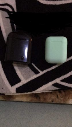 Two Bluetooth earbuds