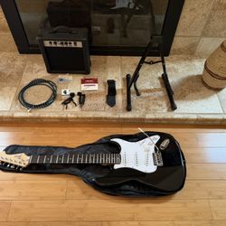 Black Stratocaster Style electric Guitar and  amp Combo