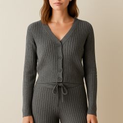 Wrap yourself in cozy elegance with our Charcoal Grey Ribbed Knit Set! Featuring a soft button-front cardigan and matching wide-leg pants