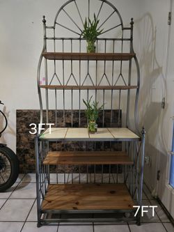 Gray iron and wood shelf in good condition. Pick up only.