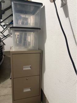 Two drawer file cabinet with key and 2 plastic file boxes.
