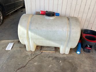 65 gallon water tank with water holes attachment