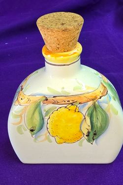 Decorative Italian Ceramic Bottle, hand-painted with lemon motifs
Material: Ceramic/Earthenware with a cork stopper. 
Design: Features vibrant hand-pa