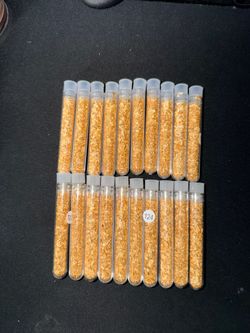 Tube of gold flakes