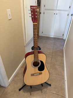 Guitar with stand