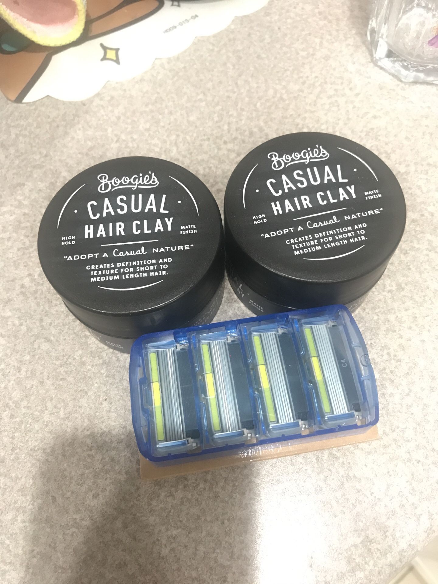 Two Boogies Casual Hair Clay and One Dollar Shave Blades