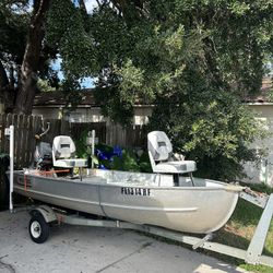 12 Ft Jon Boat W 15 Horse 2 Stroke Mercury And Trailer