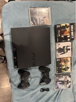 PS3 SLIM 500gb console with controllers and games