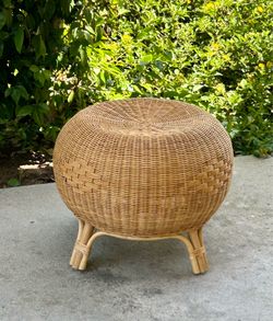 Wicker and rattan ottoman or side table