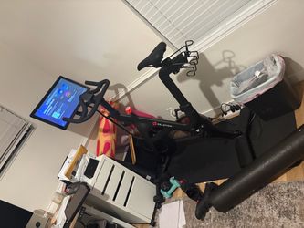 Peloton Bike – Gen 2 Touchscreen + Swivel Upgrade + Cycling Shoes – $250
