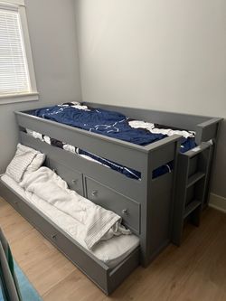 Captain bed with trundle and storage drawers