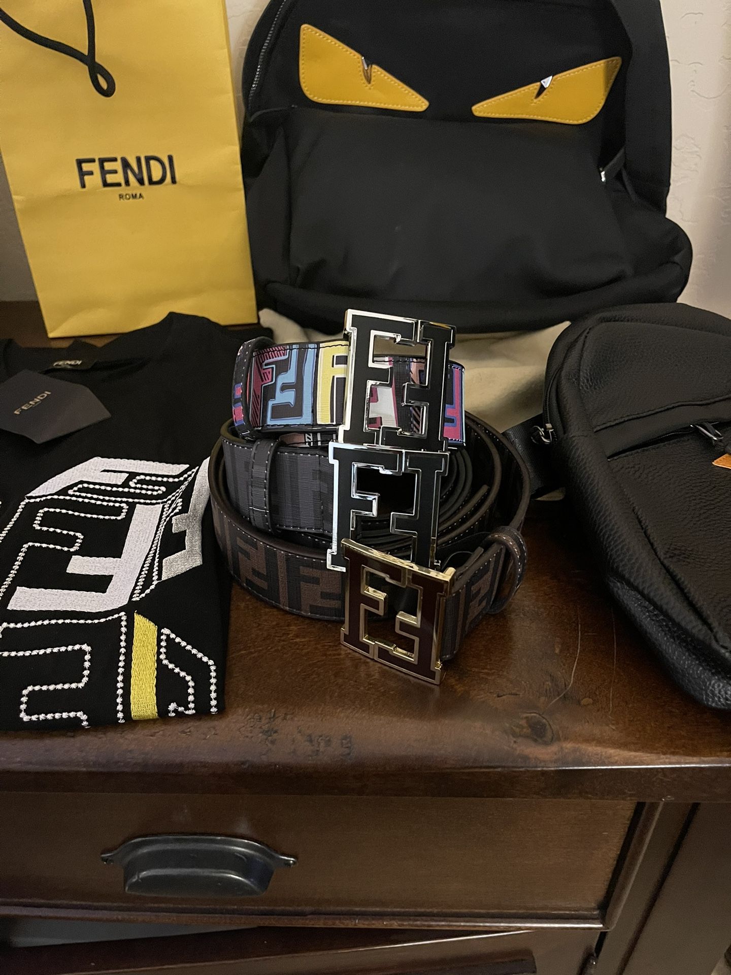 Fendi Collection Men’s Clothing, Women’s Braclet. Bags , Belts, & Shirts!