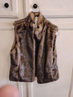 Women's brown faux fur vest.