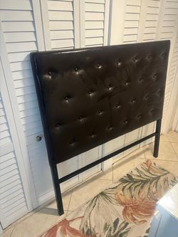Queen size leather headboard .. dark brown…$150