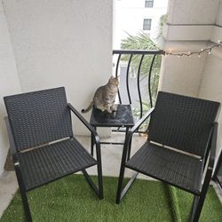 2 Chairs And A Table For Porch Area