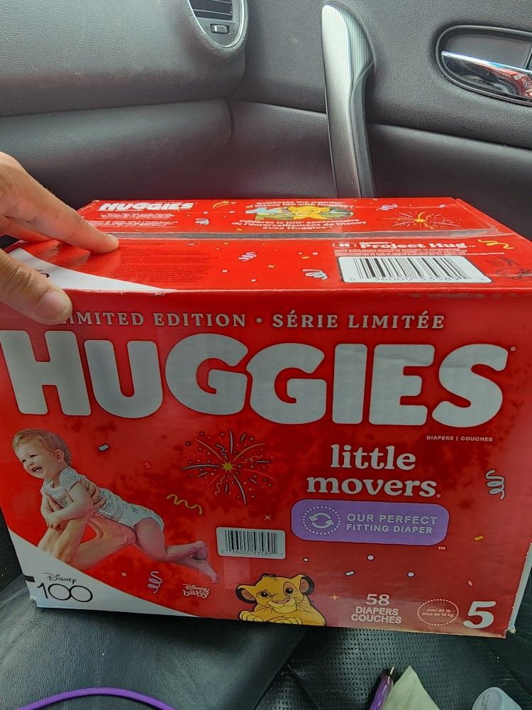 2 Boxes Of HUGGIES SIZE 5 DIAPERS